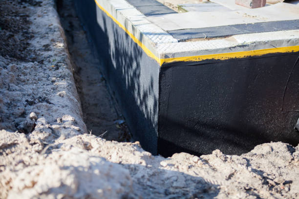 Professional Emergency Waterproofing technician working in Pompeii, MI